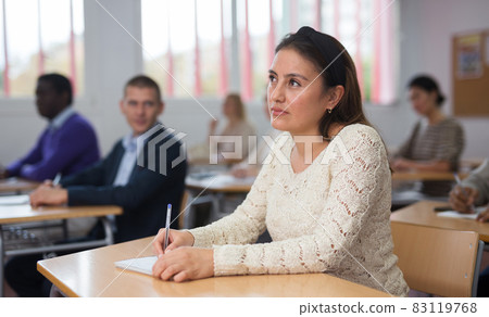 Young woman working during group business training 83119768