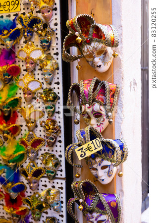 Traditional venician masks on shelves in souvenirs shop in Venice Traditional venician masks on shelves in souvenirs shop in Venice 83120255