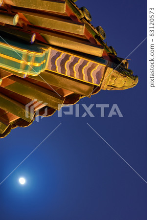 Moonrise above the old pagoda on top of the Jingshan park hill in Beijing, China 83120573