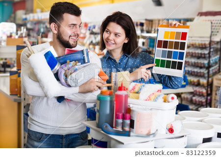 Couple deciding on best color scheme Couple deciding on best color scheme 83122359