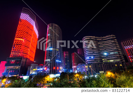 Night view of the Sanlitun Soho buildings in downtown Beijing, China 83122714