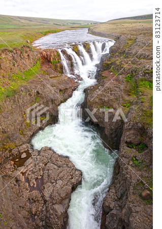 Kolugljufur canyon and waterfall at the north of Iceland Kolugljufur canyon and waterfall at the north of Iceland 83123714