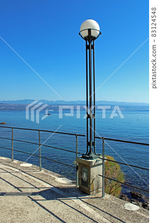 View from Lovran's seaside promenade, Adriatic coast, Kvarner bay, city details, Croatia View from Lovran's seaside promenade, Adriatic coast, Kvarner bay, city details, Croatia 83124548