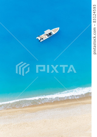 Aerial drone view of moored boat near the coast of Zakynthos, Greece Aerial drone view of moored boat near the coast of Zakynthos, Greece 83124593