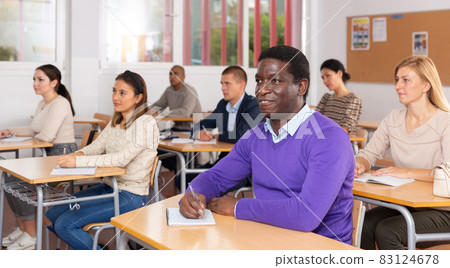 Positive adult african american student on professional training 83124678