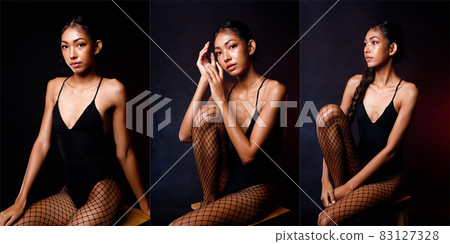Half Body Portrait of 20s Asian Woman tanned skin black hair vast short pants. Slim Girl Half Body Portrait of 20s Asian Woman tanned skin black hair vast short pants. Slim Girl 83127328
