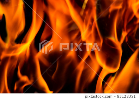 Fire and flames with a burning dark red-orange Fire and flames with a burning dark red-orange 83128351