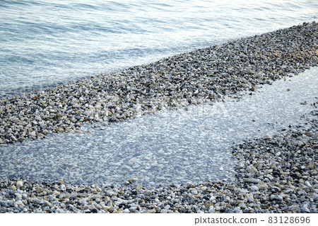 Pebbles on the beach 83128696