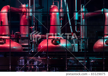 Copper stills for the production of irish Whiskey seen from the public aquare in Ardara, County Donegal - Ireland Copper stills for the production of irish Whiskey seen from the public aquare in Ardara, County Donegal - Ireland 83129875