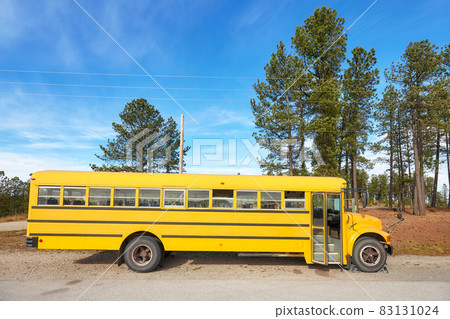 School bus parked at the side of a country road, South Dakota, USA. School bus parked at the side of a country road, South Dakota, USA. 83131024