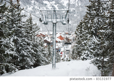Chairlift intermediate tower at ski resort 83131977