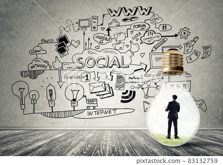 Businessman trapped in bulb 83132759