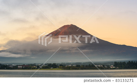 Red Fuji at dawn seen from the shore of Lake Kawaguchi Red Fuji at dawn seen from the shore of Lake Kawaguchi 83133271