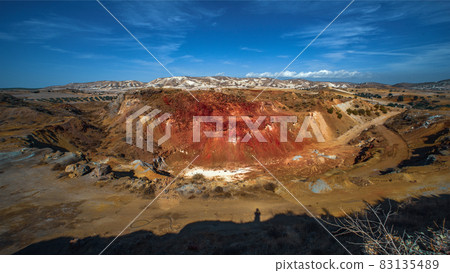 Troulloi copper mine in Cyprus. Abandoned open pit and red cap (gossan) rich with iron oxides and quartz 83135489