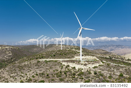 Wind turbines on top of the hills. Oreites wind farm in Paphos district, Cyprus Wind turbines on top of the hills. Oreites wind farm in Paphos district, Cyprus 83135492