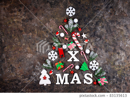 Christmas tree made from letters X-MAS and decoration Christmas tree made from letters X-MAS and decoration 83135613