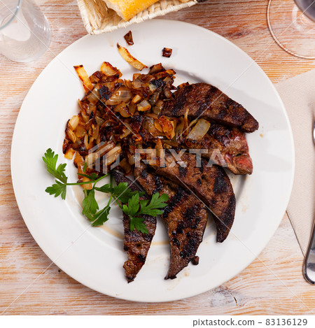 Tasty cooked fried liver pork with fried onion Tasty cooked fried liver pork with fried onion 83136129