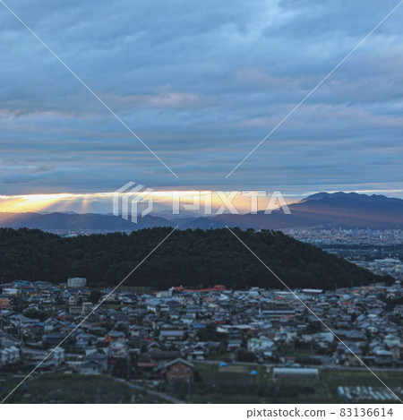Countryside landscape and ladder of light Countryside landscape and ladder of light 83136614