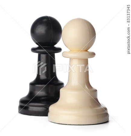 Black and white chess pieces on white background 83137345
