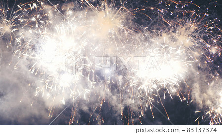 Golden Firework celebrate anniversary happy new year 2022, 4th of july holiday festival. Gold firework in the night time celebrate national holiday. Countdown to new year 2022 gold party time event Golden Firework celebrate anniversary happy new year 2022, 4th of july holiday festival. Gold firework in the night time celebrate national holiday. Countdown to new year 2022 gold party time event 83137374
