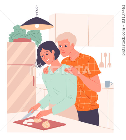 Woman prepares a meal a loving man embraces her from behind 83137463