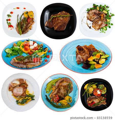 Set with dishes of delicious fried pork and beef with greens, garnish 83138559