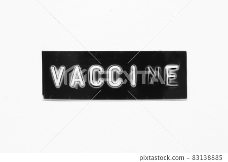 Black color banner that have embossed letter with word vaccine on white paper background Black color banner that have embossed letter with word vaccine on white paper background 83138885