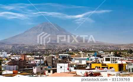 Misty Volcano seen from Yanahuara in Arequipa, Peru Misty Volcano seen from Yanahuara in Arequipa, Peru 83139769
