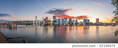 Portland, Oregon, USA skyline at dusk on the Willamette River. Portland, Oregon, USA skyline at dusk on the Willamette River. 83140674