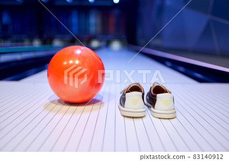 Ball and house shoes, bowling, game concept Ball and house shoes, bowling, game concept 83140912