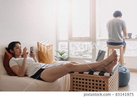 Couple living work and rest in the same room apartment. Couple living work and rest in the same room apartment. 83141975