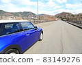 Drive with blue MINI on a sunny day 83149276
