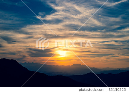 Sunset in the clouds before sunset and haze mountains Oku Chichibu Mountains From Minano Town, Saitama Prefecture c-3 Cyan Sunset in the clouds before sunset and haze mountains Oku Chichibu Mountains From Minano Town, Saitama Prefecture c-3 Cyan 83150223