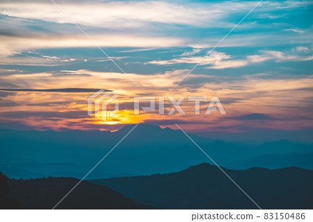 Sunset between the clouds setting over Mt. Ryokami Okuchichibu Mountains From Minano Town, Saitama Prefecture a-4 Cyan matte feeling 83150486