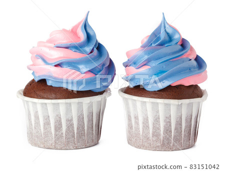 Two cupcakes isolated on white background close up Two cupcakes isolated on white background close up 83151042