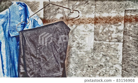 Shirt and pants hang on a hanger 83156908