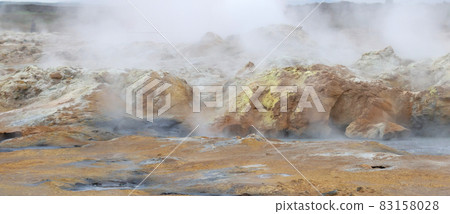 Steaming fumarole in geothermal area of Hverir, Iceland 83158028