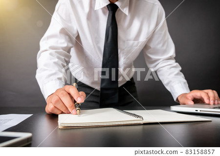 Business and banking concept close up business man signing contract Business and banking concept close up business man signing contract 83158857
