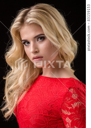 Beautiful sexy blonde woman on black background, party. Beautiful sexy blonde woman on black background, party. 83159153