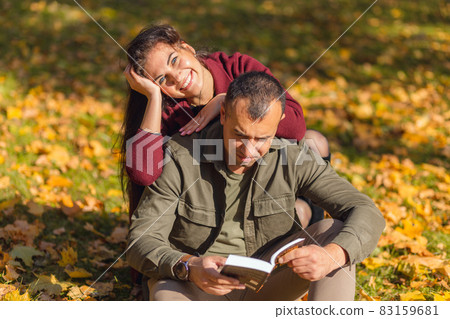 Lovely couple having fun together in nature. Lovely couple having fun together in nature. 83159681