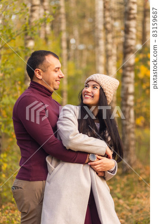 Lovely couple having fun together in nature. Lovely couple having fun together in nature. 83159687
