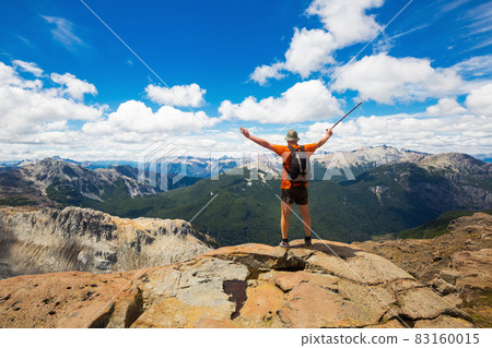 Elderly tourist climbed to top of cliff Elderly tourist climbed to top of cliff 83160015