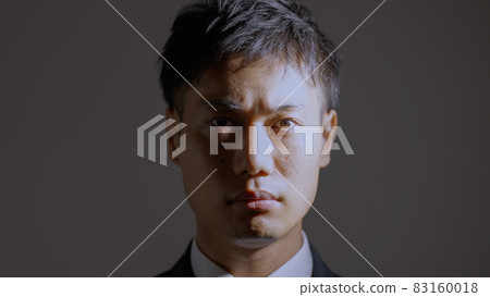 A serious middle-aged businessman 83160018