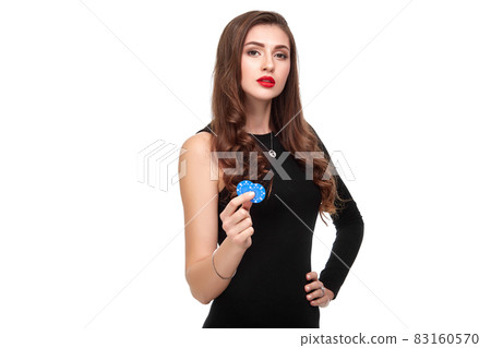 Sexy curly hair brunette posing with chips in her hands, poker concept isolation on white background Sexy curly hair brunette posing with chips in her hands, poker concept isolation on white background 83160570