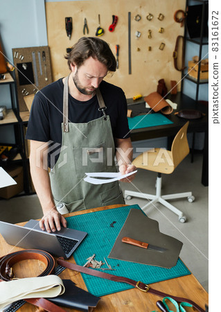 Modern Artisan Using Laptop Modern Artisan Using Laptop 83161672