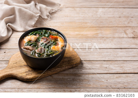 Beef, okra stew and spinach soup in bowl Beef, okra stew and spinach soup in bowl 83162103