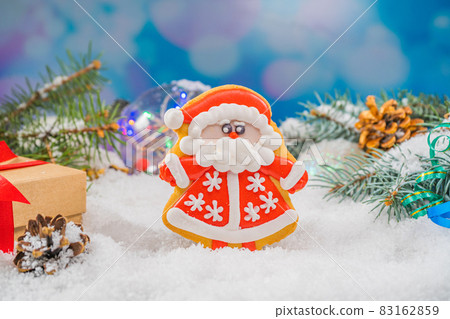 Christmas background with tiger gingerbread 2022. Holiday mood card. Family traditions, DIY, celebration concept. Festive background with homemade gingerbread cookies. Christmas background with tiger gingerbread 2022. Holiday mood card. Family traditions, DIY, celebration concept. Festive background with homemade gingerbread cookies. 83162859