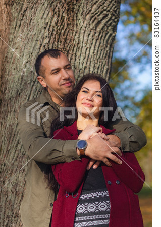 Lovely couple having fun together in nature. 83164437
