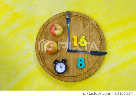 Intermittent Fasting 16:8. Popular health and fitness trend. Flat lay. Healthy eating, weight loss Intermittent Fasting 16:8. Popular health and fitness trend. Flat lay. Healthy eating, weight loss 83165134