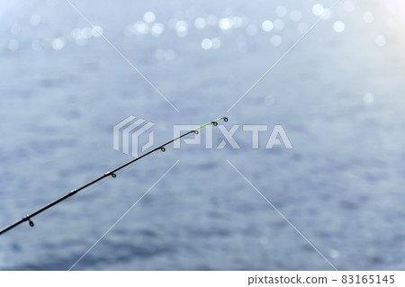 Rod for fishing in water. No people. Copy space. Selective focus Rod for fishing in water. No people. Copy space. Selective focus 83165145